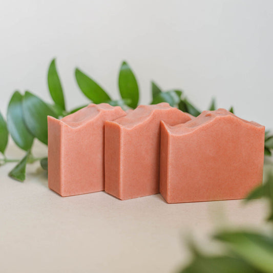 three handmade bars of pink soap scented with a blend of essential oils